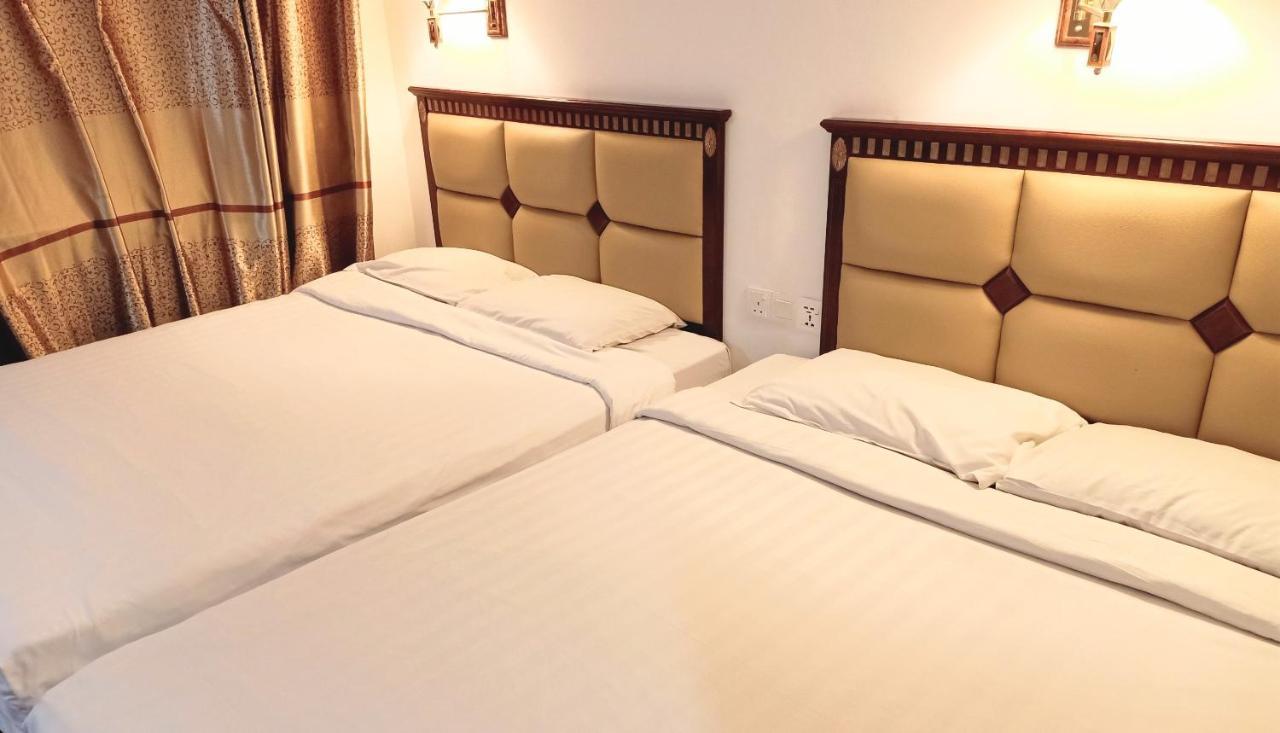 Super Oyo 90464 Borneo Suites Hotel Κότα Κιναμπαλού Εξωτερικό φωτογραφία