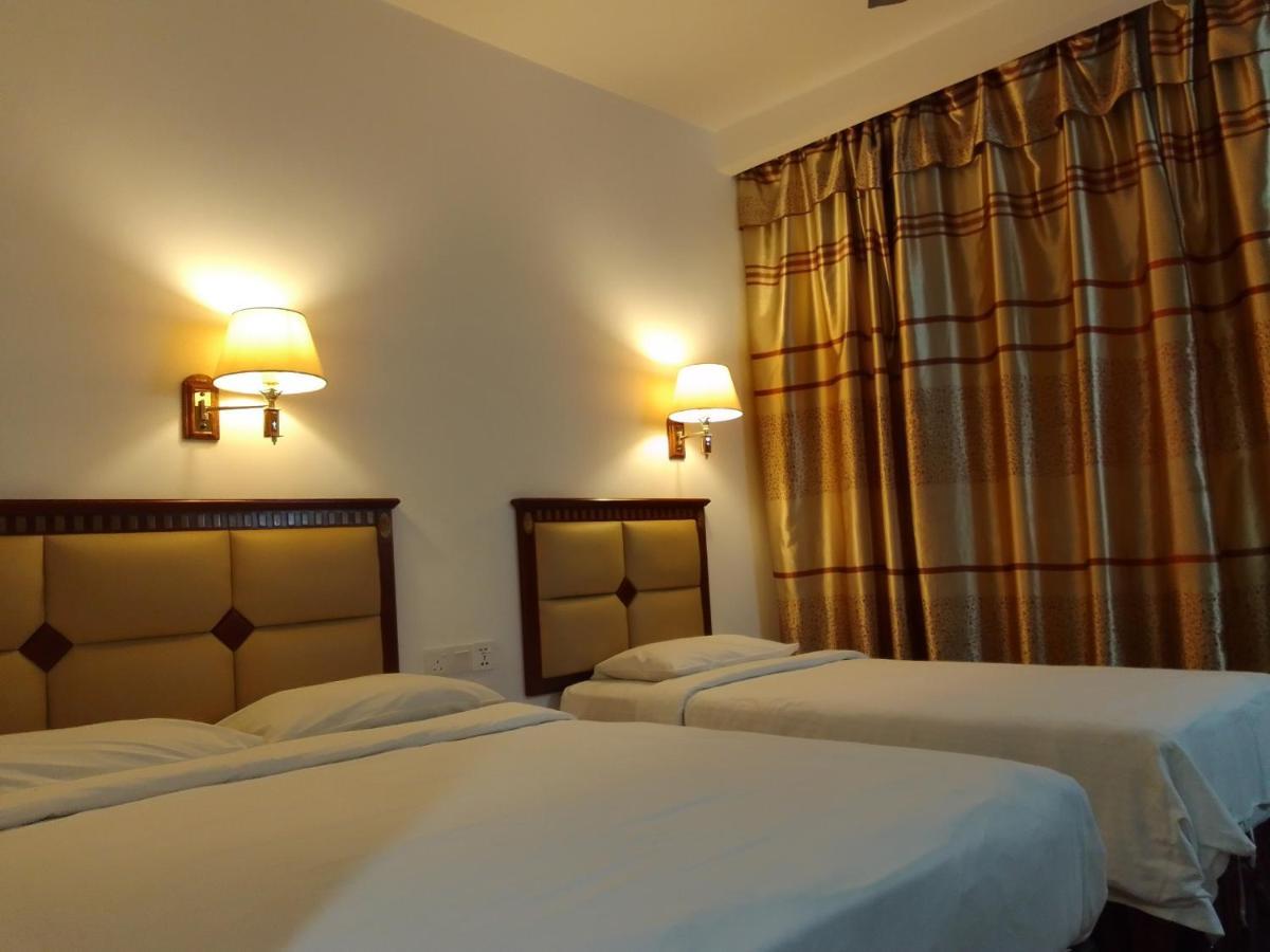 Super Oyo 90464 Borneo Suites Hotel Κότα Κιναμπαλού Εξωτερικό φωτογραφία